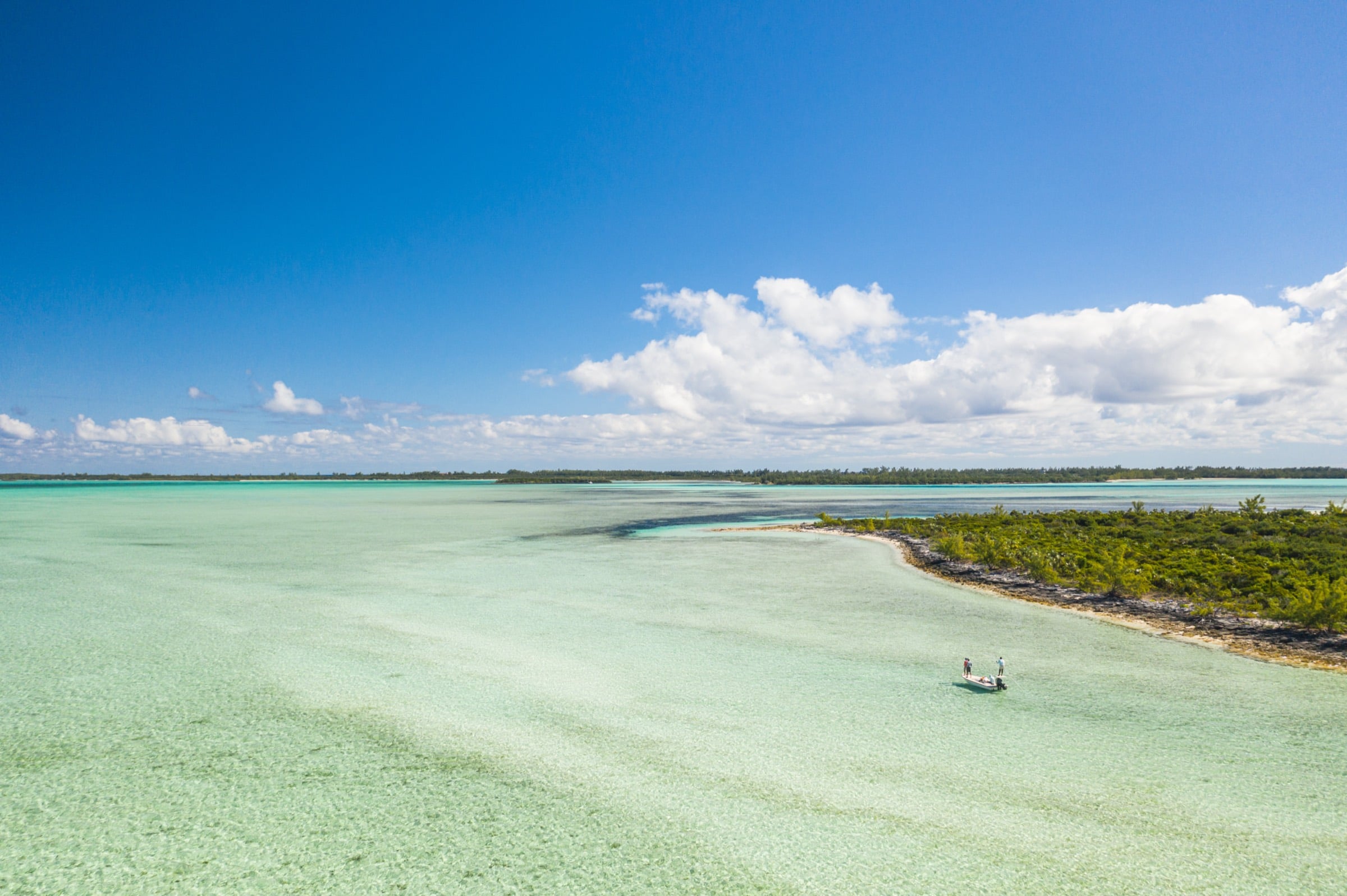A wide saltwater flat under open sky
