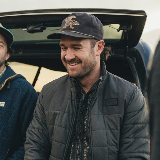 Howler Brothers Unstructured Snapback: Osprey Prey : Black Twill | Tailwaters Fly Fishing