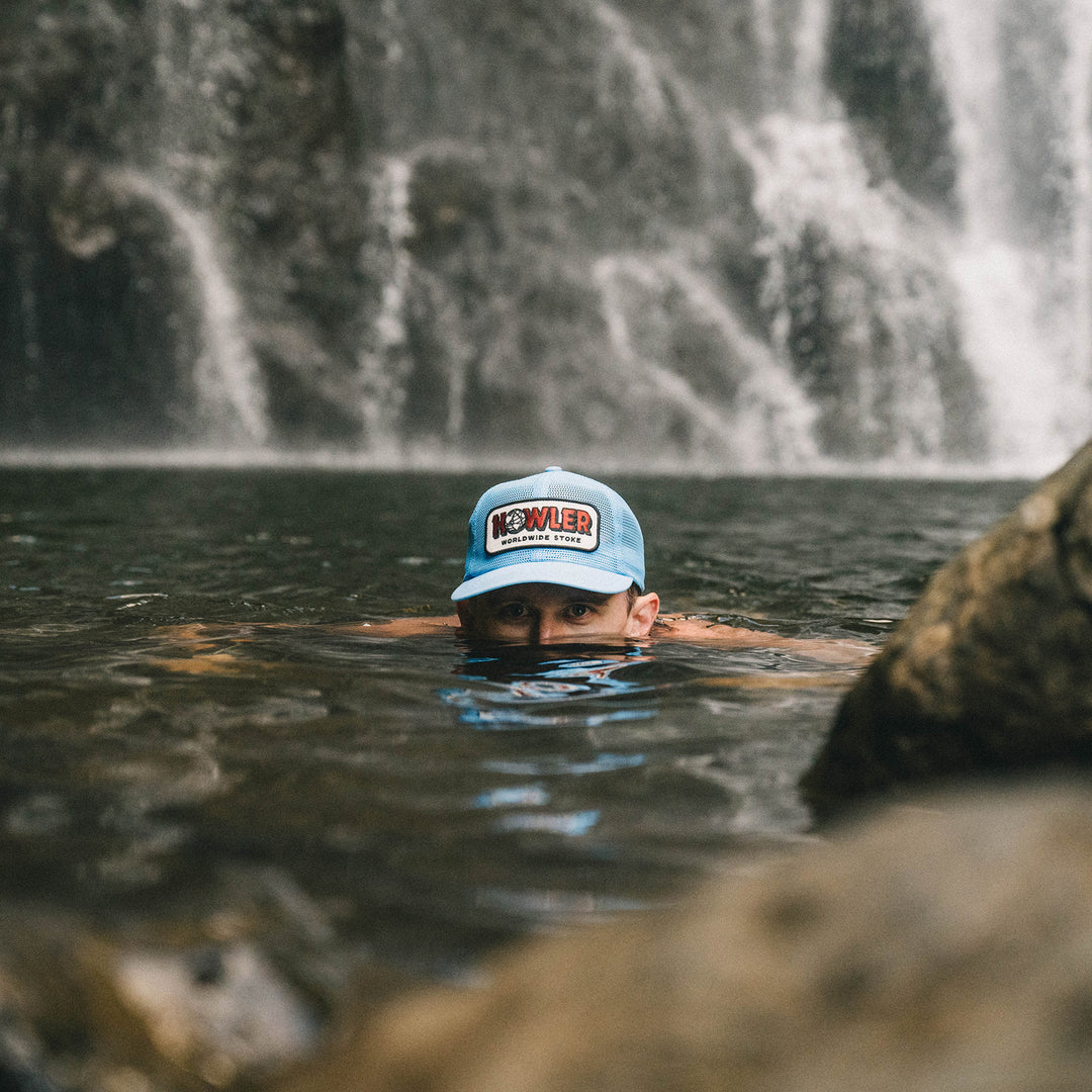 Howler Brothers Unstructured Snapback Hats  - Worldwide Stoke : Light Blue | Tailwaters Fly Fishing