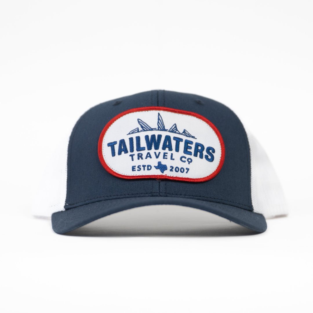 Tailwaters Fly Fishing Red & Blue Travel Trucker Hat | Tailwaters Fly Fishing